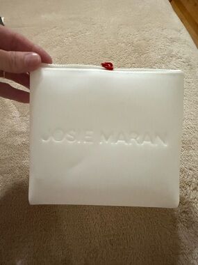 JOSIE MARAN White Cosmetic Zip Pouch with Red Pull